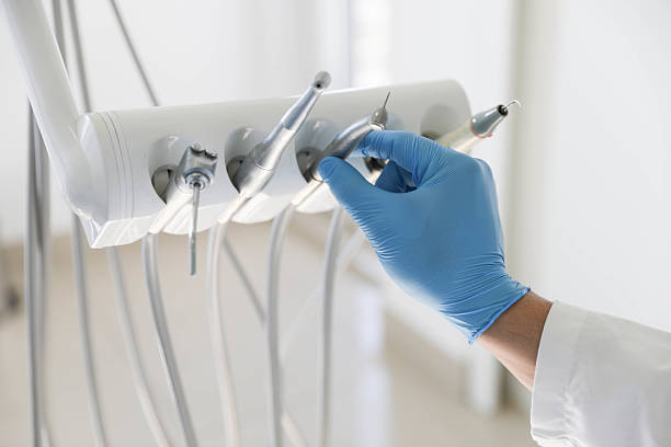 Professional Tooth Extraction technician working in Fredericksburg city County, VA